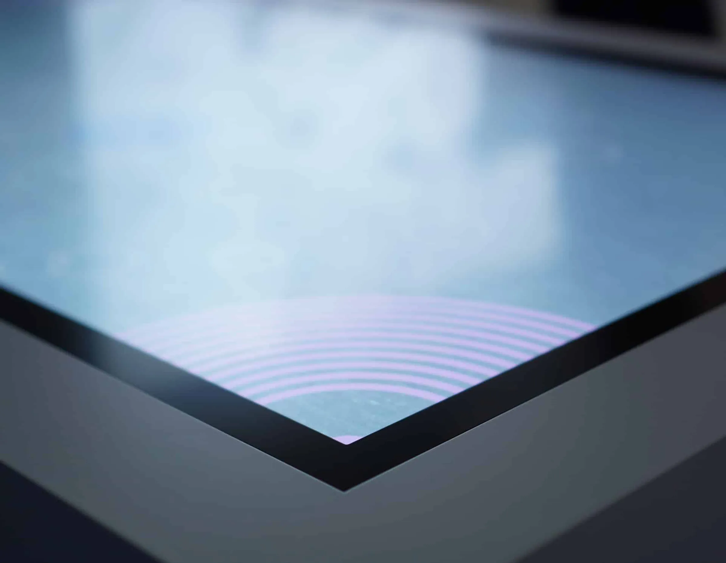 Multitouch table with a 4K touchscreen and LED lighting in the showroom